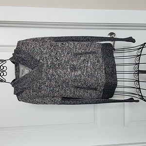 Lucky Lotus (Lucky) hooded sweater. Knit detail on front.